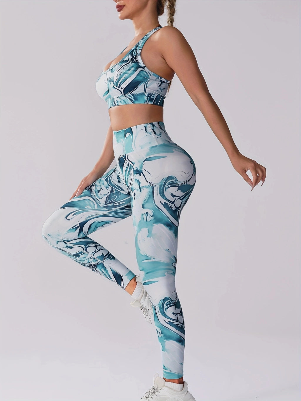 Get Fit in Style: Women's 2-Piece Yoga Set - High-Waist Leggings & Racerback Crop Top.