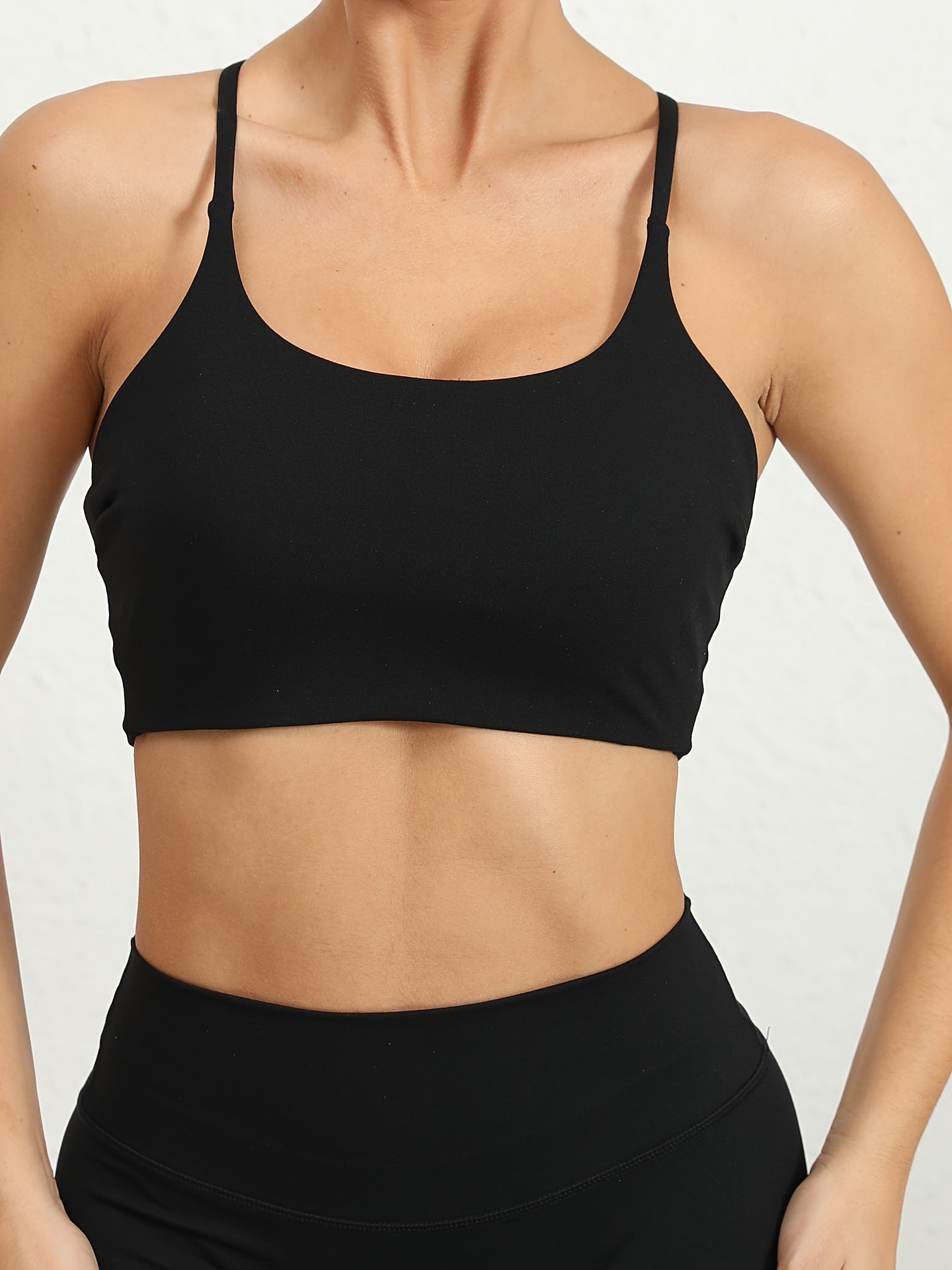 Women's Yoga Sports Bra, Cross-Back Strappy Design, Fitness Running Pilates Top, Athletic Gym Wear, Breathable Moisture-Wicking Fabric.