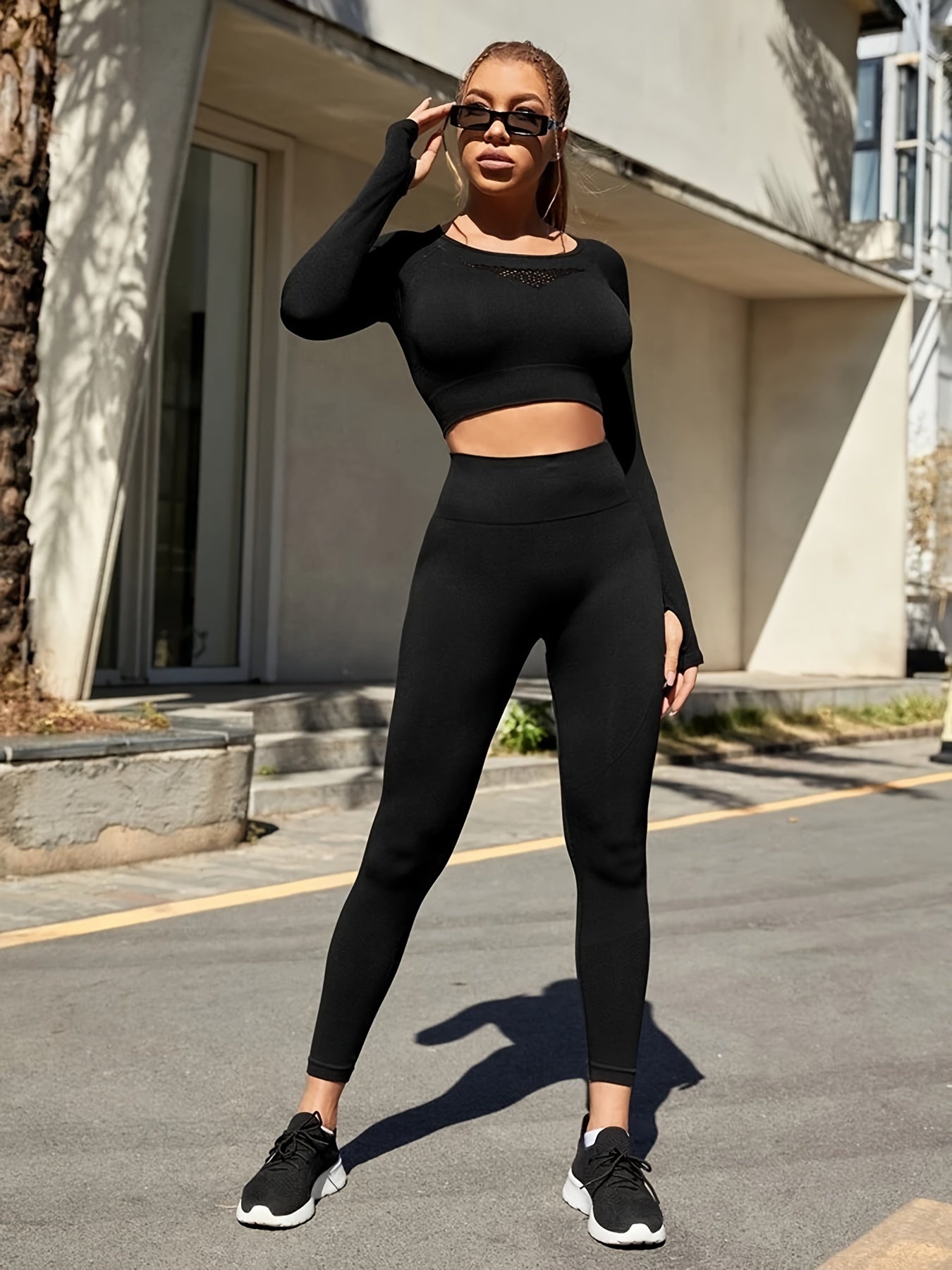 Upgrade Your Workout with our Seamless Yoga Suit - Long Sleeve Crop Top & High Waist Leggings for Women.