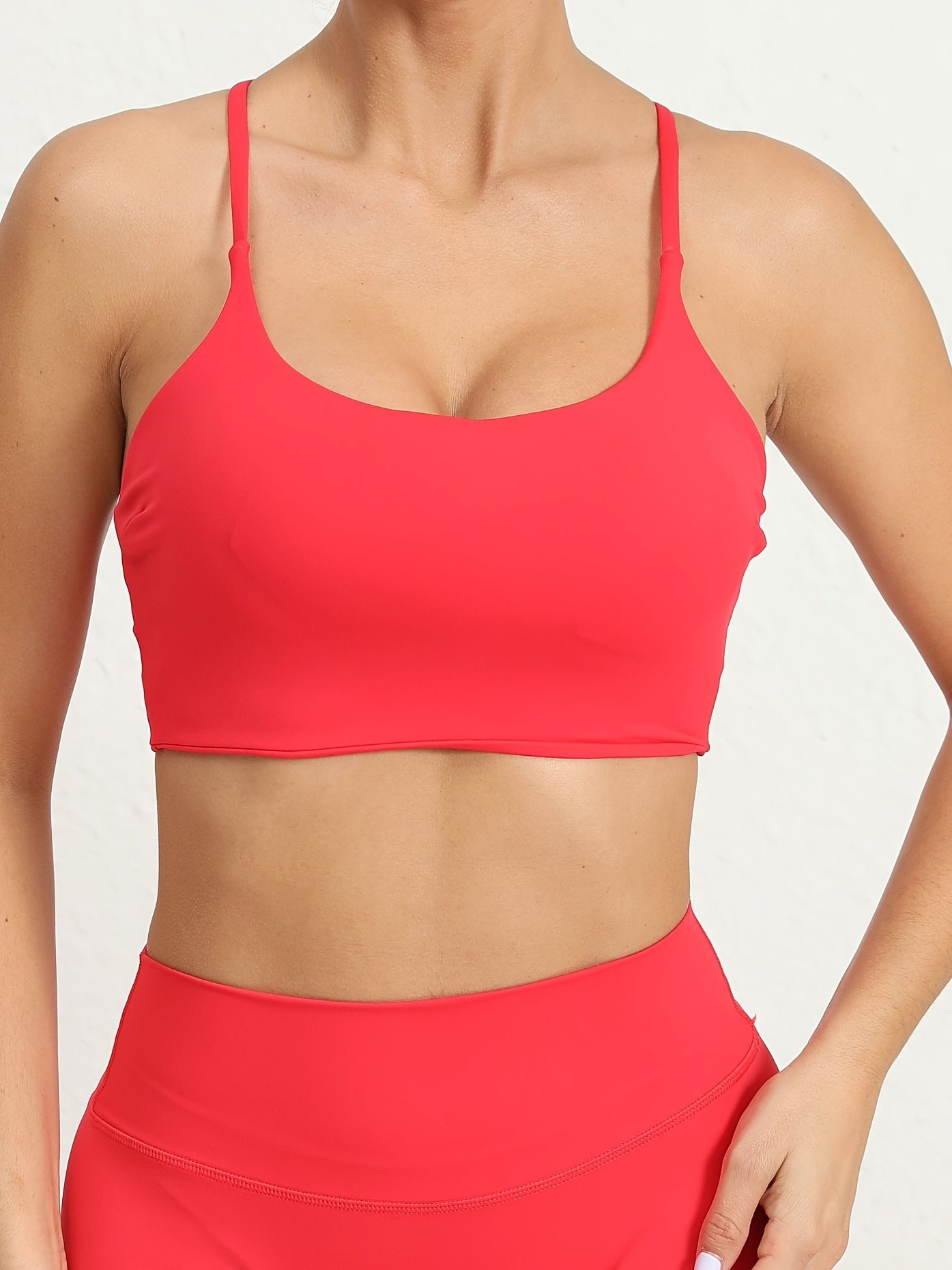 Women's Yoga Sports Bra, Cross-Back Strappy Design, Fitness Running Pilates Top, Athletic Gym Wear, Breathable Moisture-Wicking Fabric.