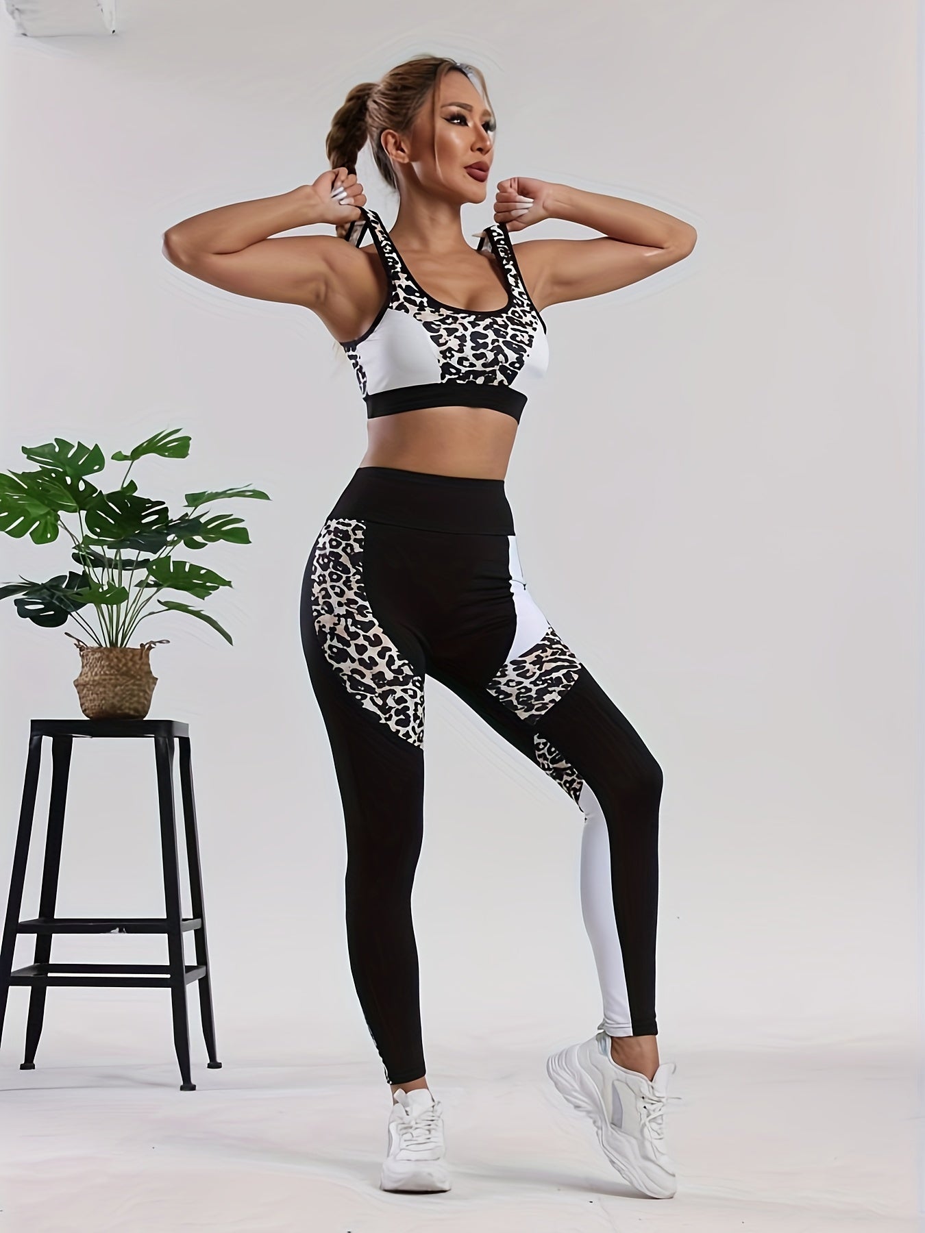 Women's 2-Piece Sportswear Set, Leopard Print and Black, High-Waisted Leggings and Sports Bra, Quick-Dry Athletic Wear for Gym and Yoga.